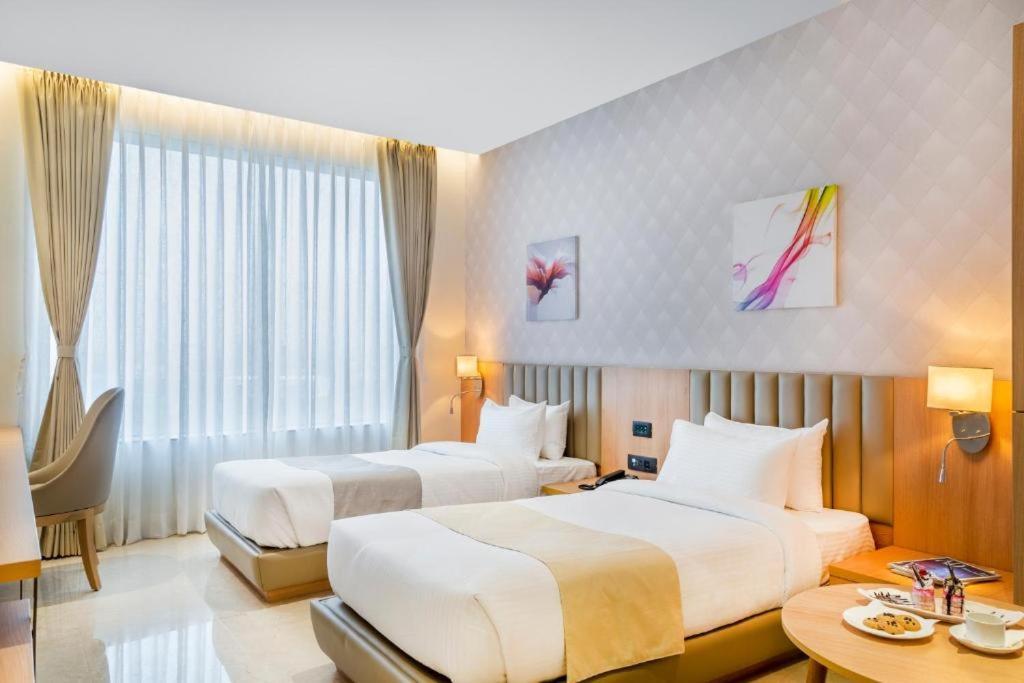 Hotel Plaza International Near Delhi Airport Nova Deli Quarto foto