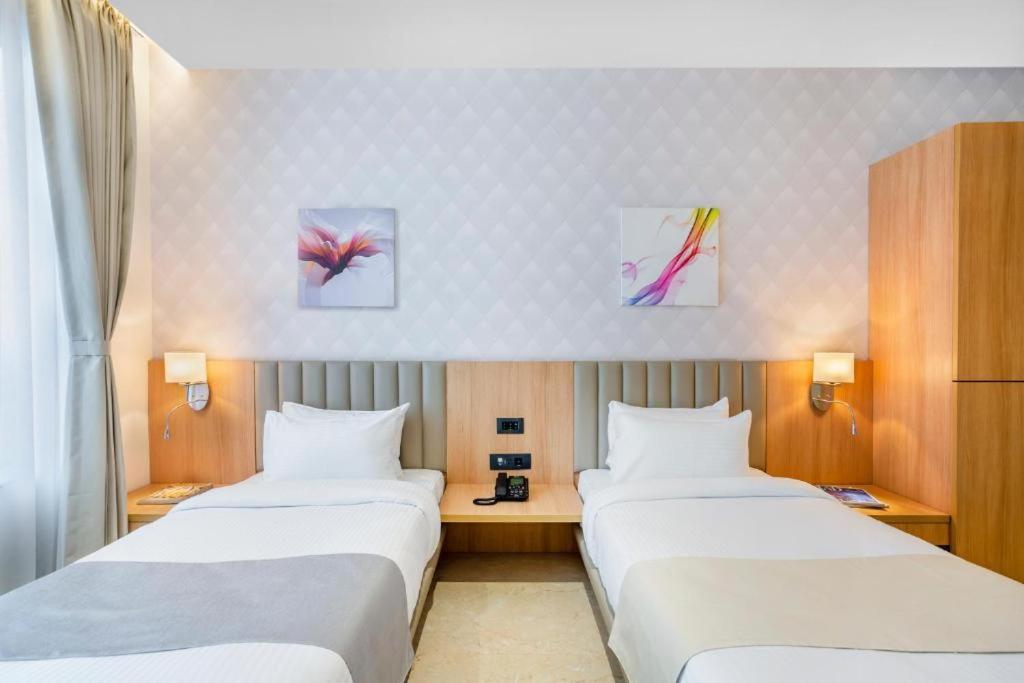 Hotel Plaza International Near Delhi Airport Nova Deli Quarto foto